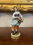 C19th French Porcelain Figure Carrying A Basket Of Flowers