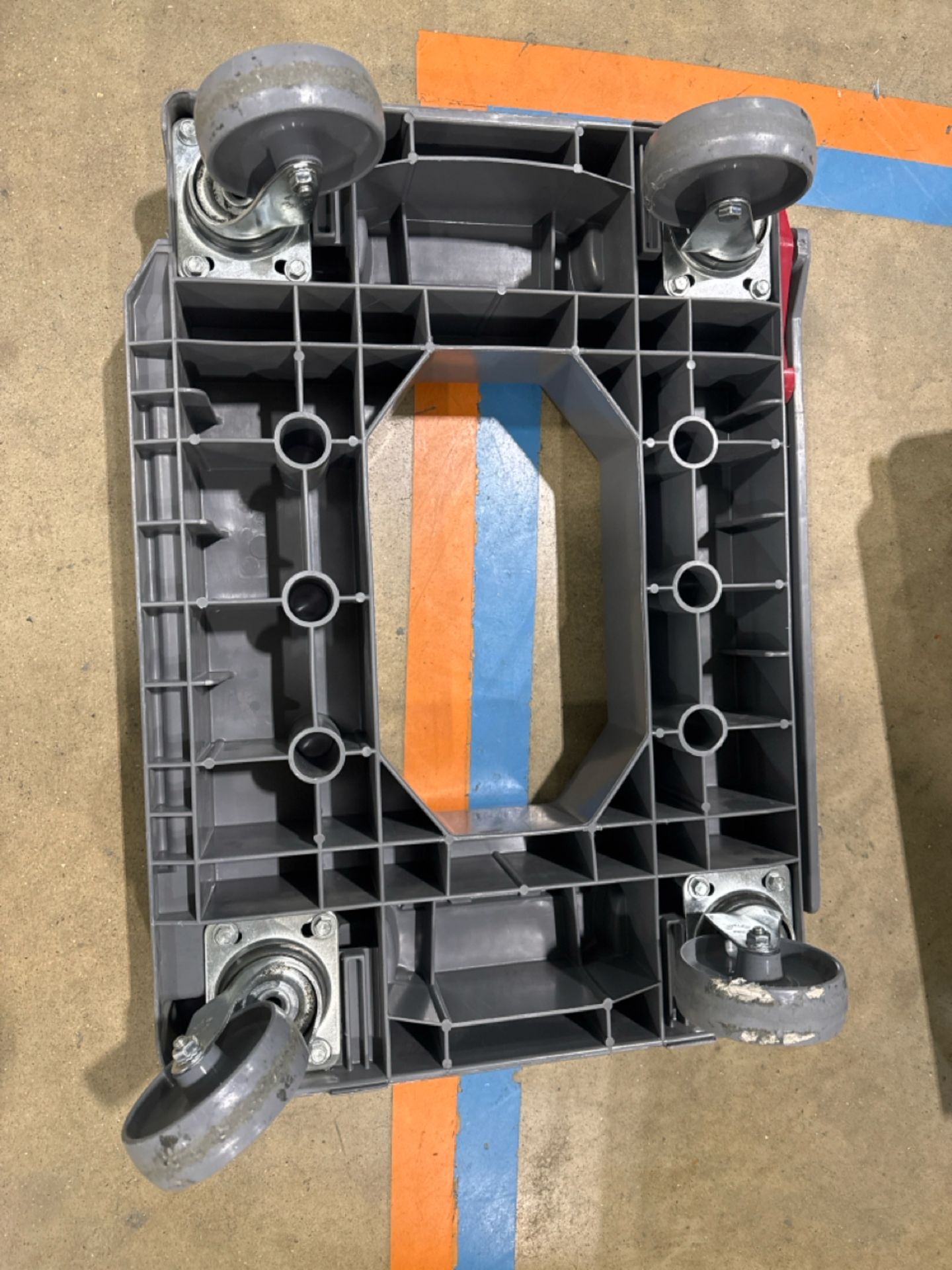 Plastic Wheeled Dolly x100