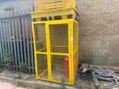 Yellow Metal Storage Cage