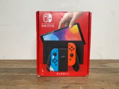 Nintendo Switch OLED Red + Blue Edition
