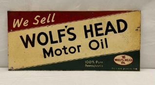 We Sell Wolf's Head Oil Rack Sign