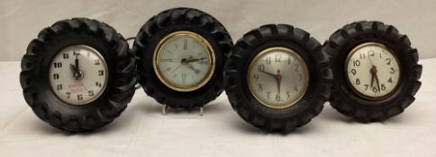 Four Tractor Tire Clocks