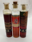 Three Early Skelly Test Bottles w/ Cork and Pape Labels