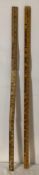 Two Skelly Yard Sticks