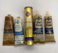 Five Skelly Grease Tubes