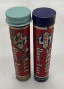 Two Skelly Door-Ease Grease Tins