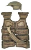 AN UNUSUAL SOUTHEAST ASIAN DECORATED COPPER ALLOY HALF ARMOUR
