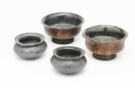 TWO SHEET SILVER MOUNTED WOOD TEABOWLS, TIBET, CIRCA 1900