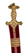 A HIGHLY DECORATED NORTH INDIAN SWORD (TALWAR) WITH GOLD-ENCRUSTED GEM-SET HILT,