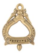 AN INDIAN COPPER ALLOY STIRRUP (RAKAB)