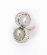 A CULTURED PEARL AND DIAMOND RING