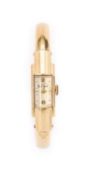 KELBERT WATCH CO.: A GOLD BANGLE WATCH, SWISS, MID 20TH CENTURY