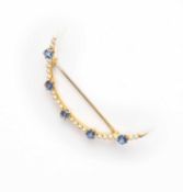 A SAPPHIRE AND SEED PEARL BROOCH, 1900s