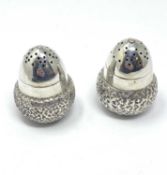 A PAIR OF VICTORIAN NOVELTY SILVER 'ACORN' PEPPERETTES, MAKER'S MARK OVERSTRUCK, BIRMINGHAM, 1886
