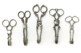 FIVE PAIRS OF VICTORIAN SILVER TEA TONGS, VARIOUS MAKERS, LONDON & BIRMINGHAM, 1851-1885
