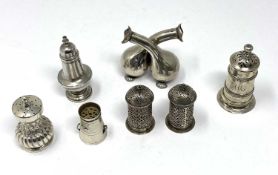 A GROUP OF SIX SMALL VICTORIAN SILVER PEPPERETTES, VARIOUS MAKERS, LONDON AND BIRMINGHAM, 1878-1889