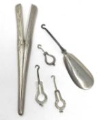 A PAIR OF VICTORIAN SILVER GLOVE STRETCHERS AND A PATENT SHOE HORN BUTTON HOOK, BOTH LONDON, 1880 /8