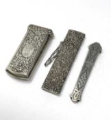 A VICTORIAN SILVER NEEDLE SELECTOR CASE AND TWO SILVER BODKIN CASES