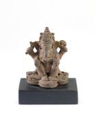 A MAHAPAHIT IRON FIGURE OF GANESHA, JAVA, 14TH CENTURY