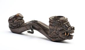 A CARVED WOOD PULLEY, BALI, INDONESIA, 19TH CENTURY
