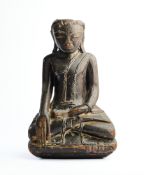 A FRAGMENTARY GILT LACQUERED WOOD FIGURE OF BUDDHA, BURMA (MYANMAR), 19TH CENTURY