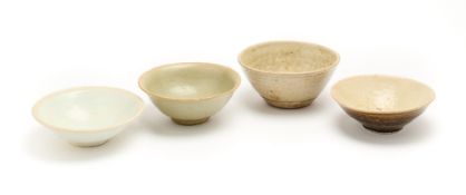 FOUR CELADON GLAZED BOWLS, SOUTH-EAST ASIA, 12TH-14TH CENTURIES