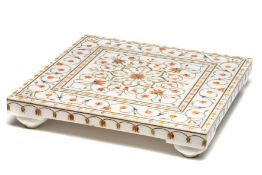 A MUGHAL STYLE PIETRA DURA INLAID MARBLE FOOTSTOOL, AGRA, NORTHERN INDIA