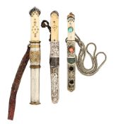 THREE TIBETAN OR BHUTANESE DAGGERS, PROBABLY 20TH CENTURY