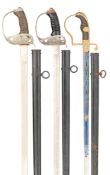 TWO IMPERIAL GERMAN 1889 MODEL DRAGOON OFFICER'S SWORDS, AND A GERMAN MILITARY OFFICER'S SWORD,