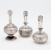 A PAIR OF VICTORIAN SILVER PEPPERETTES AND A FURTHER PEPPERETTE, C.T. & G. FOX, LONDON, 1854 / 69