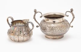 A VICTORIAN SILVER CREAM BOAT AND A SUGAR BOWL, BOTH LONDON, 1874 / 77 RESPECTIVELY