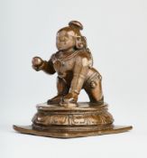 A BRONZE FIGURE OF BALAKRISHNA, TAMIL NADU, SOUTH INDIA, CIRCA 18TH CENTURY