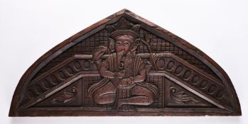 A CARVED WOOD TYMPANUM PANEL, WESTERN INDIA, 20TH CENTURY