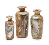 THREE ROMAN CYLINDRICAL GLASS VESSELS, CIRCA 3RD-4TH CENTURY A.D.