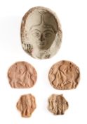 THREE FRAGMENTARY TERRACOTTA MOULDS, NORTHERN INDIA, 4TH-6TH CENTURIES