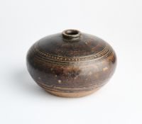 A KHMER BROWN GLAZED POTTERY BOTTLE, CAMBODIA, 12TH CENTURY