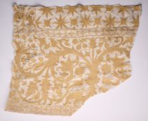 AN INDO-PORTUGUESE SILK EMBROIDERED COTTON COVERLET FRAGMENT, BENGAL, CIRCA 1600
