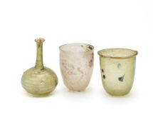 THREE ROMAN GLASS VESSELS, CIRCA 1ST-4TH CENTURY A.D.