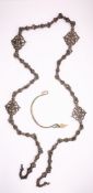 AN ELABORATE AND LONG BRONZE CHAIN, INDIA 19TH CENTURY OR EARLIER