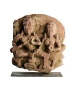 A PINK SANDSTONE RELIEF FRAGMENT DEPICTING UMAMAHESVARA, CENTRAL INDIA, 8TH/9TH CENTURY