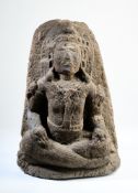 A CARVED ANDESITE FIGURE OF A SEATED DEITY, JAVA, INDONESIA, 10TH-12TH CENTURY