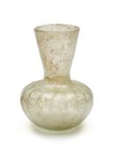 A ROMAN PALE GREEN GLASS JAR, CIRCA 2ND-4TH CENTURY A.D.