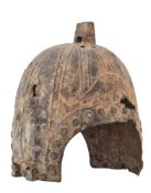 A REPRODUCTION BRONZE HELMET IN CHINESE WARRING STATES STYLE OF CIRCA 475-221 BC
