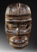 A LARGE WE-GUERE WARRIOR MASK