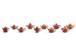 A COLLECTION OF 10 CHINESE YIXING MINIATURE TEAPOTS, 20TH CENTURY