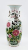 A Chinese Qianjiang and Famille Rose decorated porcelain vase - decorated with blackbirds and peonie