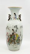 A Chinese two-sided finely decorated Famille Rose porcelain vase - with a scene of an immortal and a
