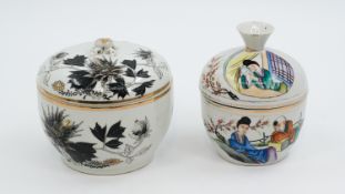 A Chinese Qianjiang and Famille Rose decorated porcelain covered pots