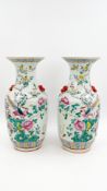 A Chinese pair of Famille Rose porcelain vases - with decor of pheasants and phoenixes