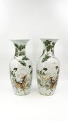 A Chinese pair of Qianjiang finely decorated porcelain vases - with the decor of ladies and a deer